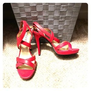 4 inch strappy hot pink heels.